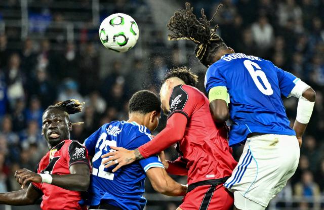 (From L) Rayo Vallecano's Senegalese midfielder #06 Pathe Ciss, Strasbourg's Ivorian defender #22 Guela Doue, Rayo Vallecano's Romanian defender #02 Andrei Ratiu and Strasbourg's French defender #06 Ismael Doukoure jump to head the ball during the UEFA Conference League semi-final second leg football match between RC Strasbourg Alsace and Rayo Vallecano de Madrid at Stade de la Meinau in Strasbourg, eastern France on May 7, 2026. (Photo by SEBASTIEN BOZON / AFP)