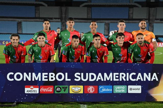 Boston River players pose for a picture before the start of the Copa Sudamericana group stage football match between Uruguay's Boston River and Colombia's Millonarios at the Centenario stadium in Montevideo on May 7, 2026. (Photo by EITAN ABRAMOVICH / AFP)