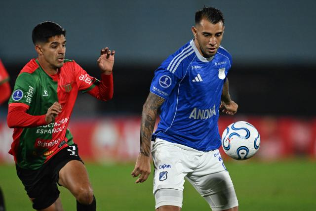 Boston River's defender #3 Marco Mancebo and Millonarios' Argentine forward #27 Rodrigo Contreras fight for the ball during the Copa Sudamericana group stage football match between Uruguay's Boston River and Colombia's Millonarios at the Centenario stadium in Montevideo on May 7, 2026. (Photo by Eitan ABRAMOVICH / AFP)