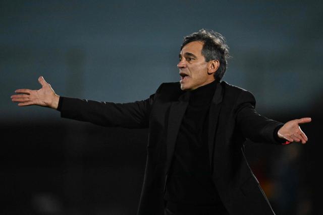 Millonarios' head coach Fabian Bustos gestures during the Copa Sudamericana group stage football match between Uruguay's Boston River and Colombia's Millonarios at the Centenario stadium in Montevideo on May 7, 2026. (Photo by Eitan ABRAMOVICH / AFP)
