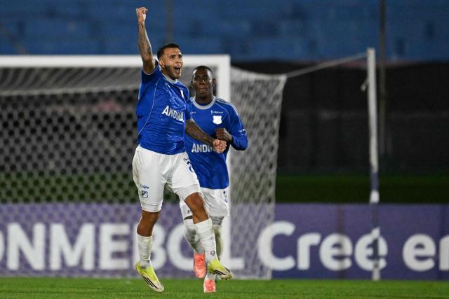 Millonarios' Argentine forward #27 Rodrigo Contreras celebrates after scoring a penalty during the Copa Sudamericana group stage football match between Uruguay's Boston River and Colombia's Millonarios at the Centenario stadium in Montevideo on May 7, 2026. (Photo by Eitan ABRAMOVICH / AFP)