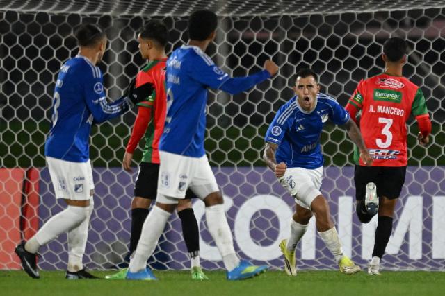 Millonarios' Argentine forward #27 Rodrigo Contreras celebrates after scoring a penalty during the Copa Sudamericana group stage football match between Uruguay's Boston River and Colombia's Millonarios at the Centenario stadium in Montevideo on May 7, 2026. (Photo by Eitan ABRAMOVICH / AFP)
