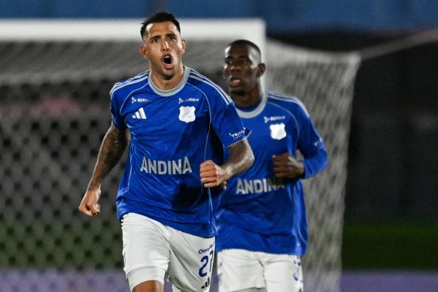 Millonarios' Argentine forward #27 Rodrigo Contreras celebrates after scoring a penalty during the Copa Sudamericana group stage football match between Uruguay's Boston River and Colombia's Millonarios at the Centenario stadium in Montevideo on May 7, 2026. (Photo by Eitan ABRAMOVICH / AFP)