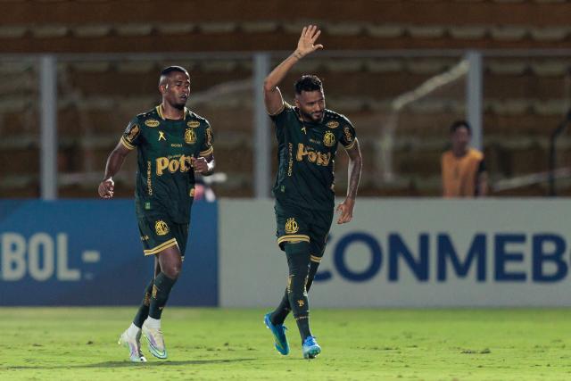 Mirassol's defender #06 Reinaldo celebrates next to Mirassol's forward #96 Carlos Eduardo after scoring his team's second goal during the Copa Libertadores group stage football match between Brazil's Mirassol and Ecuador's Liga de Quito at the Jose Maria de Campos Maia stadium in Mirassol, state of Sao Paulo, Brazil on May 7, 2026. (Photo by RAPHA MARQUES / AFP)