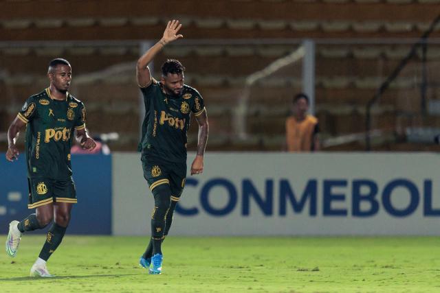 Mirassol's defender #06 Reinaldo celebrates next to Mirassol's forward #96 Carlos Eduardo after scoring his team's second goal during the Copa Libertadores group stage football match between Brazil's Mirassol and Ecuador's Liga de Quito at the Jose Maria de Campos Maia stadium in Mirassol, state of Sao Paulo, Brazil on May 7, 2026. (Photo by RAPHA MARQUES / AFP)