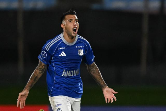 Millonarios' Argentine forward #27 Rodrigo Contreras celebrates after scoring his team's third goal during the Copa Sudamericana group stage football match between Uruguay's Boston River and Colombia's Millonarios at the Centenario stadium in Montevideo on May 7, 2026. (Photo by Eitan ABRAMOVICH / AFP)