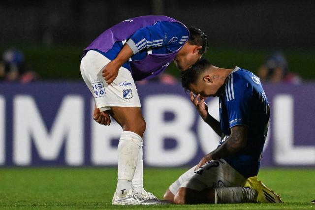 Millonarios' Argentine forward #27 Rodrigo Contreras (R) celebrates after scoring his team's third goal during the Copa Sudamericana group stage football match between Uruguay's Boston River and Colombia's Millonarios at the Centenario stadium in Montevideo on May 7, 2026. (Photo by Eitan ABRAMOVICH / AFP)
