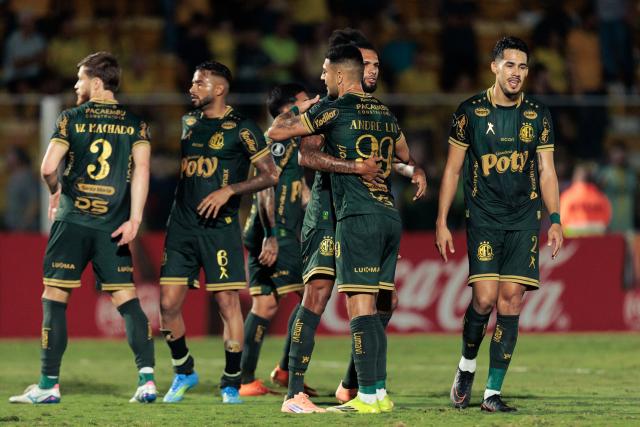 MIrassol players celebrate at the end of the Copa Libertadores group stage football match between Brazil's Mirassol and Ecuador's Liga de Quito at the Jose Maria de Campos Maia stadium in Mirassol, state of Sao Paulo, Brazil on May 7, 2026. (Photo by RAPHA MARQUES / AFP)