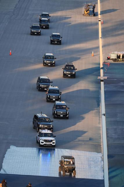 The motorcade with US President Donald Trump drives in the Lincoln Memorial Reflecting Pool during a visit to see the new blue protective coating being applied as part of a renovation project, in Washington, DC, on May 7, 2026. Workers have been resurfacing the bottom of Washington's famous Lincoln Memorial Reflecting Pool with "American flag blue"-colored material used in swimming pools, following an order by US President Donald Trump. (Photo by Alex Brandon / POOL / AFP)