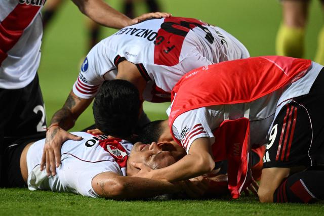 River Plate players celebarte at the end of the Copa Sudamericana group stage football match between Venezuela's Carabobo FC and Argentina's River Plate at the Misael Delgado stadium in Valencia, Carabobo state, Venezuela on May 7, 2026. (Photo by Federico PARRA / AFP)