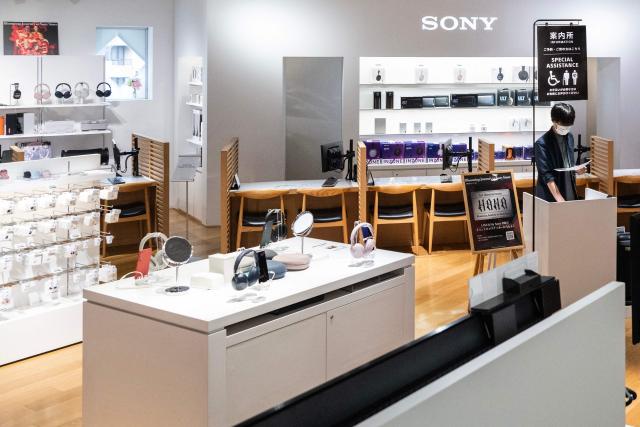 An employee is seen at a Sony showroom in Tokyo on May 8, 2026. Japanese electronics giant Sony on May 8 forecast a 13 percent rise in net profit for the year to next March, boosted by its video games operations. (Photo by Andrew CABALLERO-REYNOLDS / AFP)