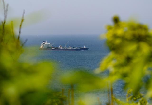 Malta-flagged oil tanker Odessa arrives near Daesan Port in Seosan City on May 8, 2026. An oil tanker that passed through the Strait of Hormuz arrived in South Korea on May 8, the first such vessel to reach the Asian nation by that route since Iran declared the critical waterway closed. (Photo by Shin Yong-ju / AFP)