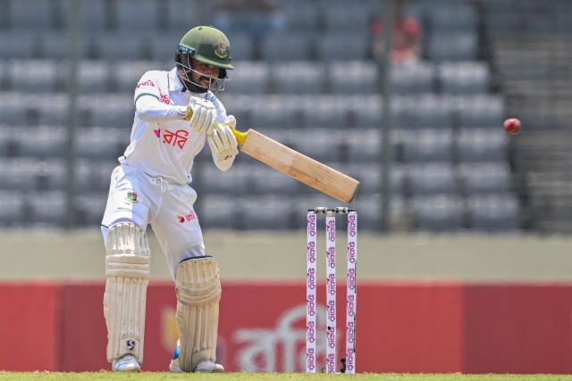 Bangladesh's Mominul Haque plays a shot during the first test cricket match between Bangladesh and Pakistan at the Sher-e-Bangla National Stadium in Mirpur on May 8, 2026. (Photo by MUNIR UZ ZAMAN / AFP)