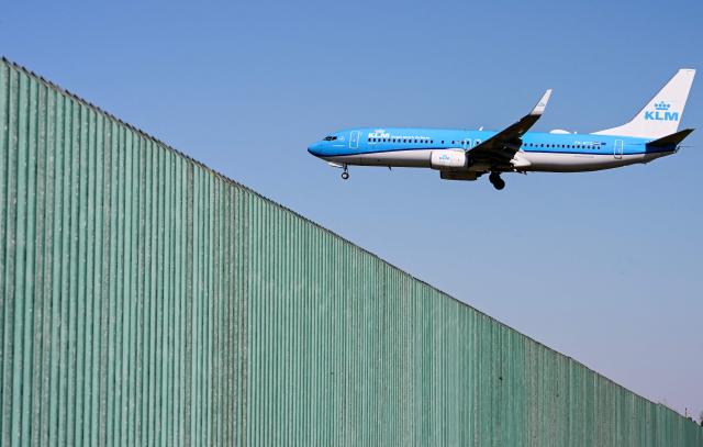 (FILES) A KLM Royal Dutch Airlines plane lands at Milan Linate airport northern Italy, on April 7, 2026. The war in the Middle East and the closure of the Strait of Hormuz have caused a surge in aviation fuel prices and raised concerns about potential shortages this summer. On May 8, 2026, the EU Aviation Safety Agency (EASA) is expected to release recommendations on whether or not to use Jet A, a kerosene produced in the United States but not currently distributed in Europe for technical reasons. (Photo by Stefano RELLANDINI / AFP)