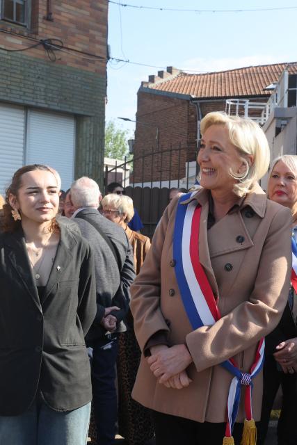 President of French far right Rassemblement National parliamentary group Marine Le Pen (R) attends a ceremony marking the 81st anniversary of VE Day, or Victory in Europe Day, which commemorates the end of World War II, in Oignies, northern France, on May 8, 2026. (Photo by Francois LO PRESTI / AFP)