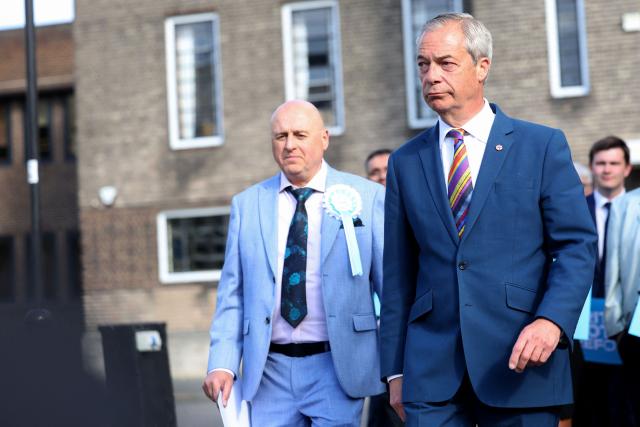 Reform UK leader Nigel Farage looks on outside Havering Town Hall a day after local elections in east London on May 8, 2026. Farage's anti-immigrant Reform UK has gained over 350 seats while Labour has lost over 240 across 40 of the 136 English councils to announce results so far. (Photo by Toby Shepheard / AFP)