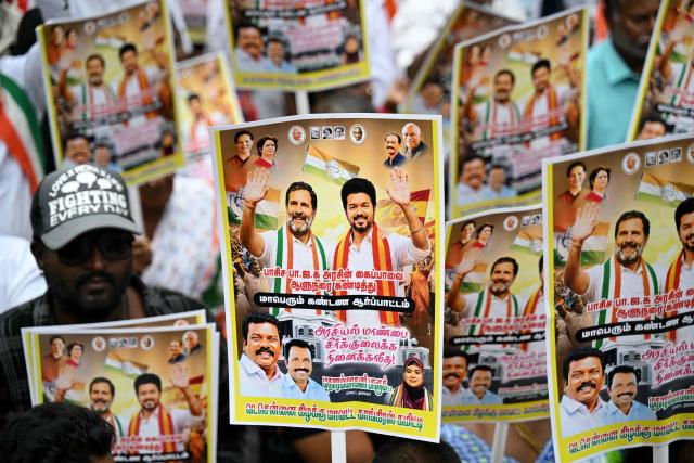 Members of India's Congress party holding placards protest as they object to the state's Governor Rajendra Vishwanath Arlekar not inviting actor and Tamilaga Vettri Kazhagam (TVK) party president C. Joseph Vijay to form the government in Chennai on May 8, 2026 after the Tamil Nadu Legislative Assembly election results. (Photo by R. Satish BABU / AFP)