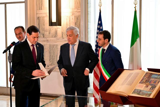 Italy's Deputy Prime Minister and Foreign Minister, Antonio Tajani (2ndR), Piedmont Region President Alberto Ciro (L) and Mayor of Casal Monferrato Emanuele Capra (R) present to U.S. Secretary of State Marco Rubio (2ndL) the family tree and documents that certify Secretary Rubio's family origins during an Italian Citizenship Conferment Ceremony at the Palazzo della Farnesina, Italy's Foreign Ministry in Rome on May 8, 2026. (Photo by Stefano RELLANDINI / POOL / AFP)