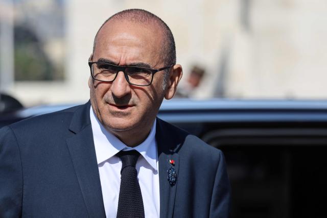France's Interior Minister Laurent Nunez arrives at the Arc de Triomphe for a ceremony marking the 81st anniversary of Victory in Europe Day, which commemorates the end of the Second World War in Europe, in Paris on 8 May 2026. (Photo by Ludovic MARIN / POOL / AFP)