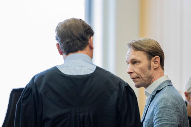 (FILES) Christian B (R), defendant and prime suspect in the 2007 disappearance of missing British toddler Madeleine McCann, speaks to his lawyer Friedrich Fuelscher prior to the verdict in his trial on five unrelated sex crimes, at the courtroom of the District Court of Braunschweig, northern Germany, on October 8, 2024. Christian Brueckner, seen as the top suspect in the 2007 disappearance of British toddler Madeleine McCann in Portugal, was arrested after being involved in a brawl with another man, police told AFP on May 8, 2026. Police in the northern city of Kiel confirmed to AFP they had launched "criminal proceedings on suspicion of mutual bodily injury" against Christian Brueckner and another unidentified person after the apparent altercation. They declined to provide any additional information. The Bild tabloid reported that the brawl occurred on April 20 after Brueckner allegedly climbed over a fence onto private property near where he lives in Kiel. (Photo by Michael Matthey / POOL / AFP)