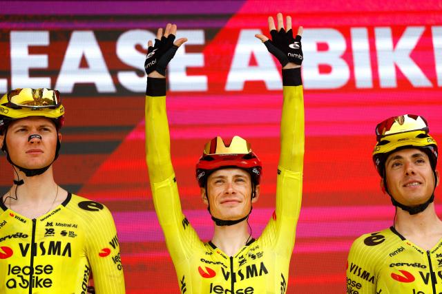 Team Visma Lease a Bike Danish rider Jonas Vingegaard (C) waves during the presentation of the teams prior the 1st stage of the Giro d'Italia 2026 - Tour of Italy cycling race between Nessebar and Burgas, Bulgaria, on May 8, 2026. (Photo by Luca Bettini / AFP)