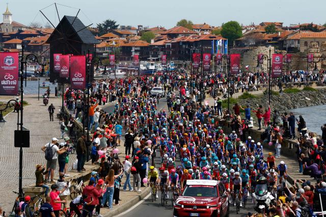 The pack rides to the start line of the 1st stage of the Giro d'Italia 2026 - Tour of Italy cycling race between Nessebar and Burgas, Bulgaria, on May 8, 2026. (Photo by Luca Bettini / AFP)