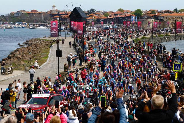The pack rides to the start line of the 1st stage of the Giro d'Italia 2026 - Tour of Italy cycling race between Nessebar and Burgas, Bulgaria, on May 8, 2026. (Photo by Luca Bettini / AFP)