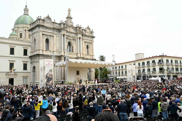Pope Leo XIV addresses the crowd outside the Shrine of the Virgin of the Rosary of Pompei during a pastoral visit in Pompei on May 8, 2026. (Photo by Andreas SOLARO / AFP)