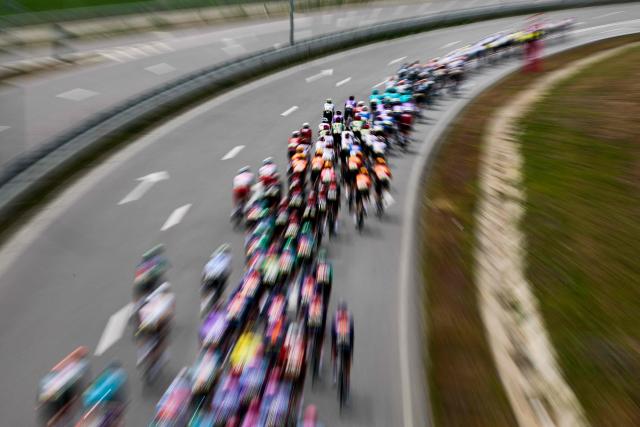 The pack rides during the 1st stage of the Giro d'Italia 2026 - Tour of Italy cycling race between Nessebar and Burgas, Bulgaria, on May 8, 2026. (Photo by Luca BETTINI / AFP)