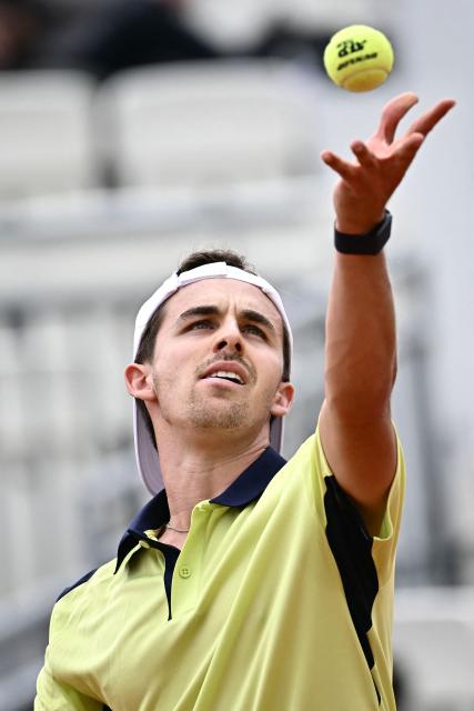 US Zachary Svajda serves to Norway's Casper Ruud during their men's singles match of the WTA Rome Open tennis tournament at the Foro Italico in Rome on May 8, 2026. (Photo by Filippo MONTEFORTE / AFP)