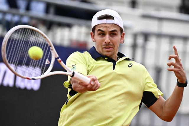 US Zachary Svajda plays a forehand return to Norway's Casper Ruud during their men's singles match of the WTA Rome Open tennis tournament at the Foro Italico in Rome on May 8, 2026. (Photo by Filippo MONTEFORTE / AFP)