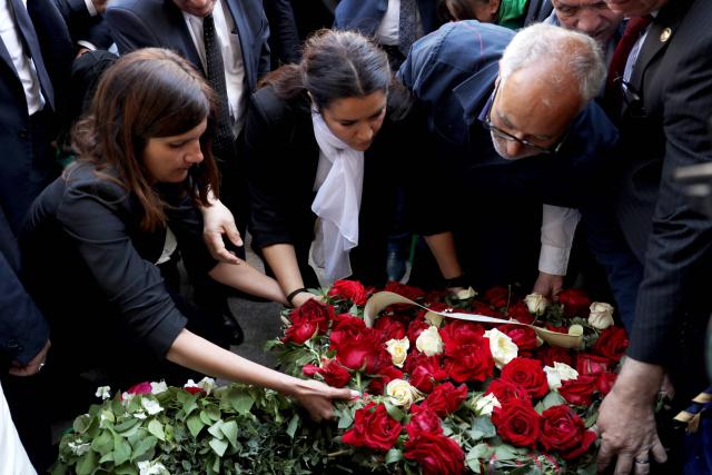 French Minister Delegate for the Armed Forces and Veterans Affairs Alice Rufo (L) and and officials lay a wreath and flowers during a commemoration ceremony marking the anniversary of the "1945 Setif massacres" in the eastern city of Setif on May 8, 2026. France announced on May 8,  the return of its ambassador to Algeria, coinciding with a ministerial visit aimed at “building trusting relations” and “restoring effective dialogue” with Algiers, following nearly two years of diplomatic crisis between the two countries. (Photo by AFP)