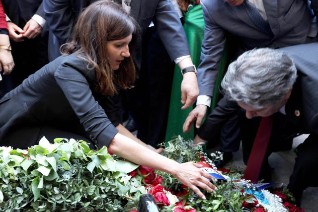 French Minister Delegate for the Armed Forces and Veterans Affairs Alice Rufo (L) and and officials lay a wreath and flowers during a commemoration ceremony marking the anniversary of the "1945 Setif massacres" in the eastern city of Setif on May 8, 2026. France announced on May 8,  the return of its ambassador to Algeria, coinciding with a ministerial visit aimed at “building trusting relations” and “restoring effective dialogue” with Algiers, following nearly two years of diplomatic crisis between the two countries. (Photo by AFP)