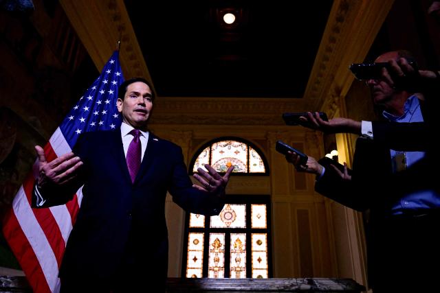U.S. Secretary of State Marco Rubio speaks to the press at the US Embassy in Rome on May 8, 2026. (Photo by Stefano RELLANDINI / POOL / AFP)