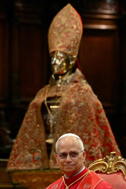 Pope Leo XIV sits in front of the statue of San Gennaro (Saint Januarius, patron of Naples) at Naples Cathedral as part of a pastoral visit in Naples on May 8, 2026. (Photo by Alberto PIZZOLI / AFP)