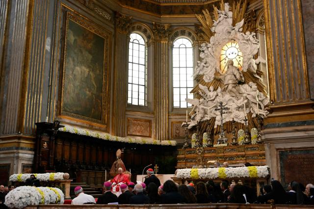 Pope Leo XIV sits in front of the statue of San Gennaro (Saint Januarius, patron of Naples) at Naples Cathedral as part of a pastoral visit in Naples on May 8, 2026. (Photo by Alberto PIZZOLI / AFP)