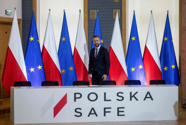 Poland's Deputy Prime Minister and Minister of Defence Wladyslaw Kosiniak Kamysz looks on before the signing of the SAFE loan agreement between the European Union and Poland at the Chancellery of the Polish Prime Minister in Warsaw on May 8, 2026. Poland participates in the new EU programme called SAFE (Security Action For Europe) that came into effect last year and under which countries can get EU loans to buy weapons and expand defence manufacturing. Poland on May 8 became the first country to sign the loan agreement to fund the modernisation of its military and arms industry, under which it will receive nearly 44 billion euros (USD 52 million). (Photo by Wojtek RADWANSKI / AFP)