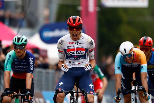 Soudal Quick-Step French rider Paul Magnier celebrates as he crosses the finish line to win the 1st stage of the Giro d'Italia 2026 - Tour of Italy cycling race between Nessebar and Burgas, Bulgaria, on May 8, 2026. (Photo by Luca Bettini / AFP)