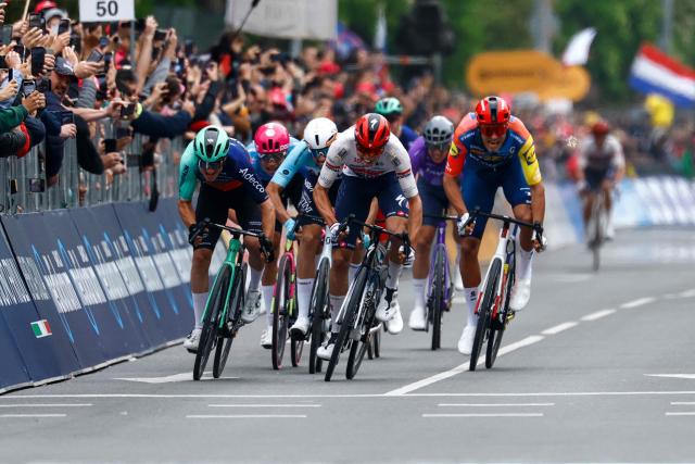 Soudal Quick-Step French rider Paul Magnier (C) sprints to the finish line to win the 1st stage of the Giro d'Italia 2026 - Tour of Italy cycling race between Nessebar and Burgas, Bulgaria, on May 8, 2026. (Photo by Luca Bettini / AFP)
