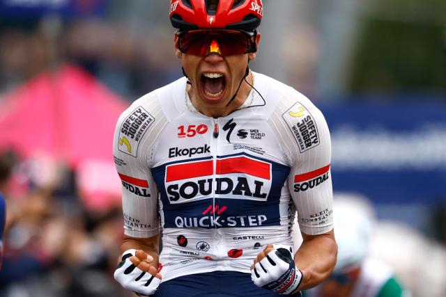 Soudal Quick-Step French rider Paul Magnier celebrates as he crosses the finish line to win the 1st stage of the Giro d'Italia 2026 - Tour of Italy cycling race between Nessebar and Burgas, Bulgaria, on May 8, 2026. (Photo by Luca Bettini / AFP)