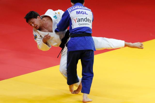 Kazakhstan's Talgat Orynbassar (white) and Mongolia's Sukhbat Byambasuren compete in the men's under 60 kg gold medal bout at the Astana Grand Slam judo tournament in Astana on May 8, 2026. (Photo by STANISLAV FILIPPOV / AFP)