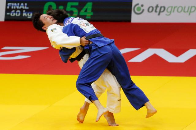 Kazakhstan's Talgat Orynbassar (white) and Mongolia's Sukhbat Byambasuren compete in the men's under 60 kg gold medal bout at the Astana Grand Slam judo tournament in Astana on May 8, 2026. (Photo by STANISLAV FILIPPOV / AFP)