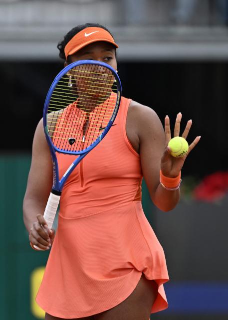 Japan's Naomi Osaka prepares to serve to Germany's Eva Lys during their women's singles match of the WTA Rome Open tennis tournament at the Foro Italico in Rome on May 8, 2026. (Photo by Tiziana FABI / AFP)