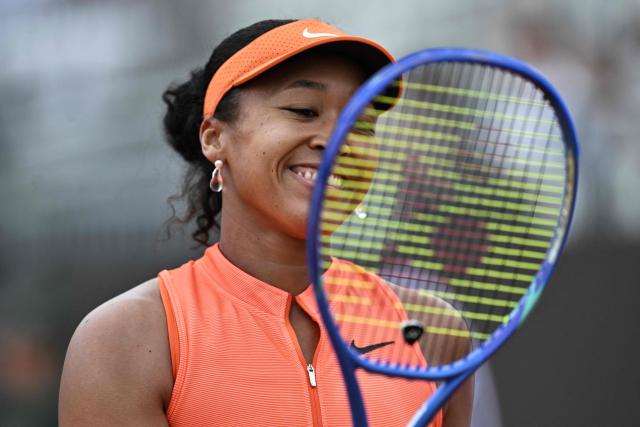 Japan's Naomi Osaka reacts as she plays against Germany's Eva Lys during their women's singles match of the WTA Rome Open tennis tournament at the Foro Italico in Rome on May 8, 2026. (Photo by Tiziana FABI / AFP)