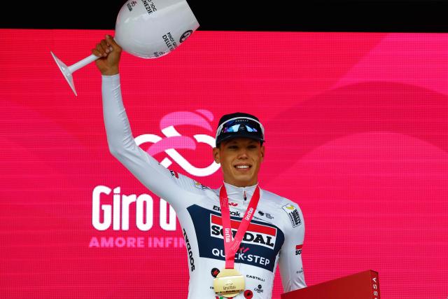 Soudal Quick-Step French rider Paul Magnier poses on the podium after winning the 1st stage of the Giro d'Italia 2026 - Tour of Italy cycling race between Nessebar and Burgas, Bulgaria, on May 8, 2026. (Photo by Luca Bettini / AFP)