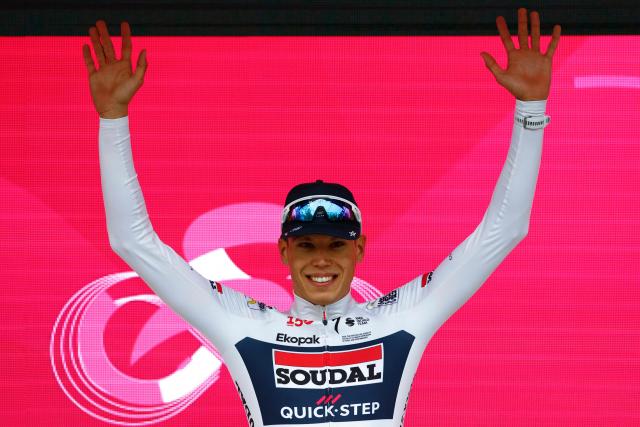 Soudal Quick-Step French rider Paul Magnier poses on the podium after winning the 1st stage of the Giro d'Italia 2026 - Tour of Italy cycling race between Nessebar and Burgas, Bulgaria, on May 8, 2026. (Photo by Luca Bettini / AFP)