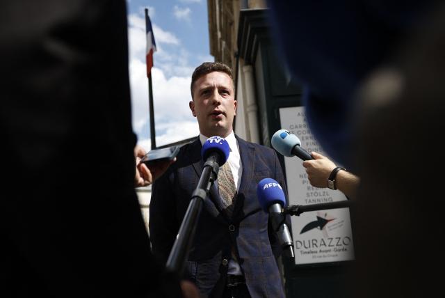 Jean-Eudes Gannat, spokesperson of the 'Comite du 9-Mai' (C9M), addresses the press in Paris on May 8, 2026 after the Paris Administrative Court upheld the ban on the demonstration organized by this far-right group, as well as the ban on the anti-fascist counter-demonstration, both of which were scheduled to take place in the capital on May 9, 2026. (Photo by SIMON WOHLFAHRT / AFP)