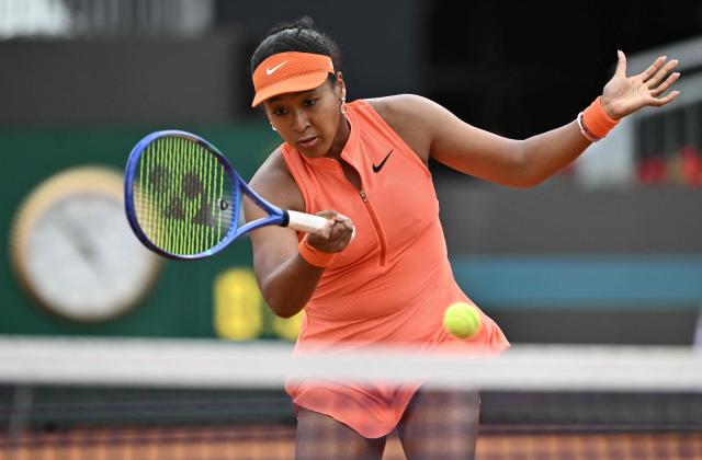 Japan's Naomi Osaka plays a forehand return to Germany's Eva Lys during their women's singles match of the WTA Rome Open tennis tournament at the Foro Italico in Rome on May 8, 2026. (Photo by Tiziana FABI / AFP)