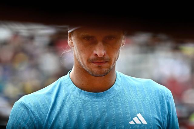 Germany's Alexander Zverev reacts as he plays against Germany's Daniel Altmaier during their men's singles match of the WTA Rome Open tennis tournament at the Foro Italico in Rome on May 8, 2026. (Photo by Filippo MONTEFORTE / AFP)