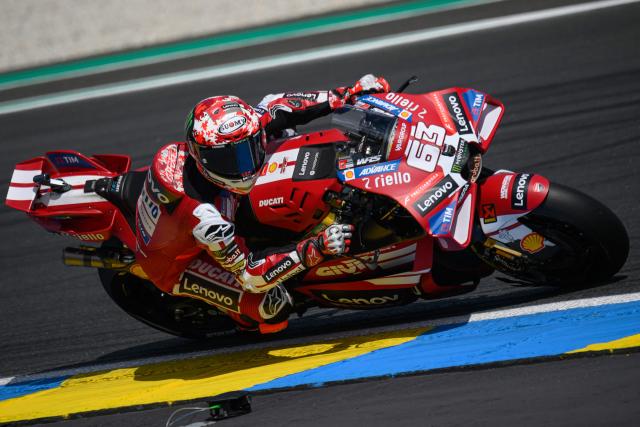Ducati Lenovo Team's Italian rider Francesco Bagnaia corners during the first practice session ahead of the French Moto GP Grand Prix of France at Le Mans, northwestern France, on May 8, 2026. (Photo by Loic VENANCE / AFP)